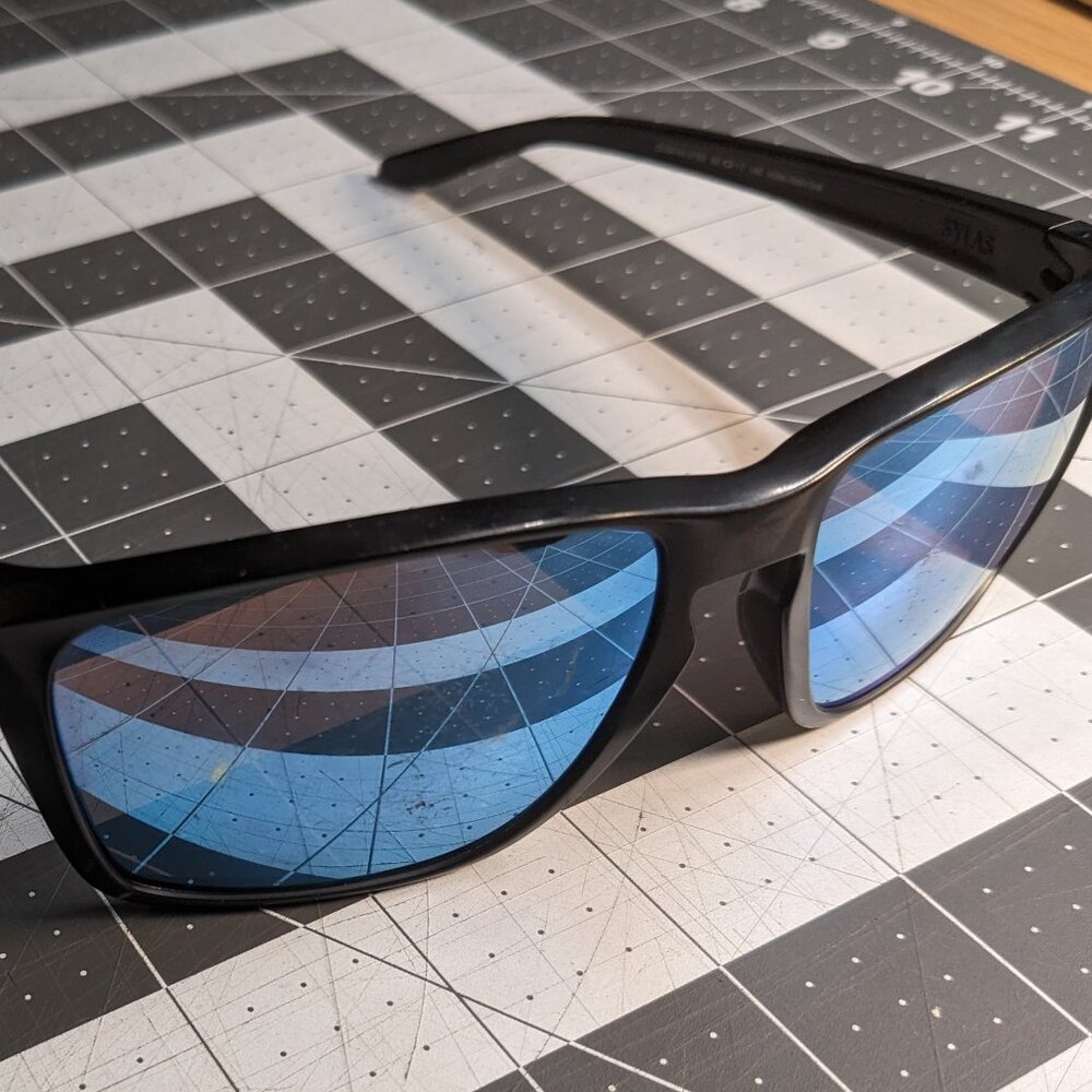 OAKLEY SYLAS - Prizm Sapphire Polarized Lenses (SCRATCHED) Matte Black Frame